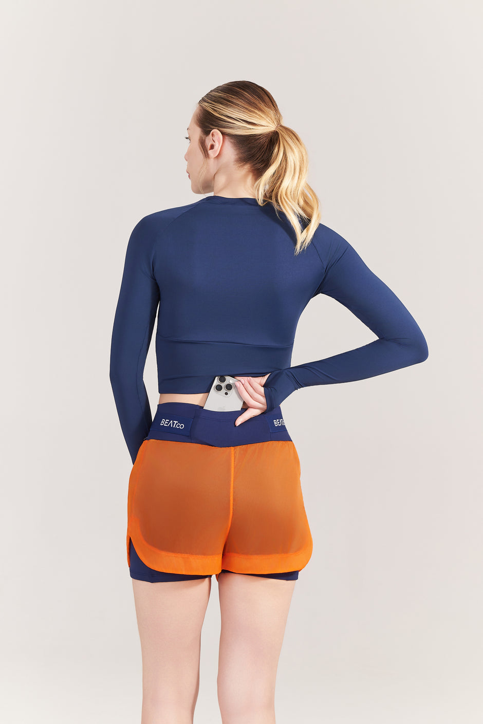 Short Feminino RunPro Marinho com Laranja – BEAT.co